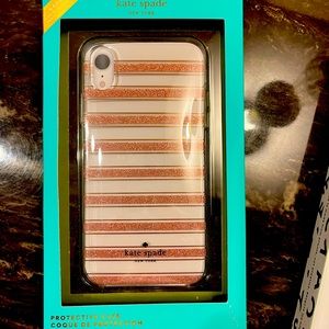 Two iPhone XR cases . A Kate Spade brand new = $9 & a Blue Glitter Case = $9.